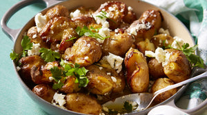 ROAST POTATOES WITH FETA, CHILLIES AND MINT